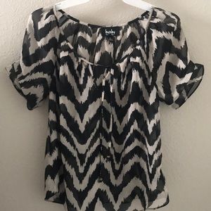 Black and beige/cream top